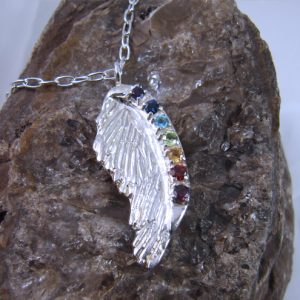 Sterling silver angel wing pendant with chakra gemstones