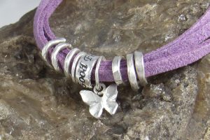 Silver and suede friendship bracelets with wish for sentiment charms